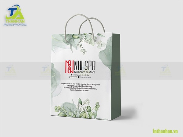 Túi giấy đựng mỹ phẩm Túi giấy đựng mỹ phẩm sang trọng với họa tiết lá xanh dịu nhẹ, quai dây xoắn chắc chắn